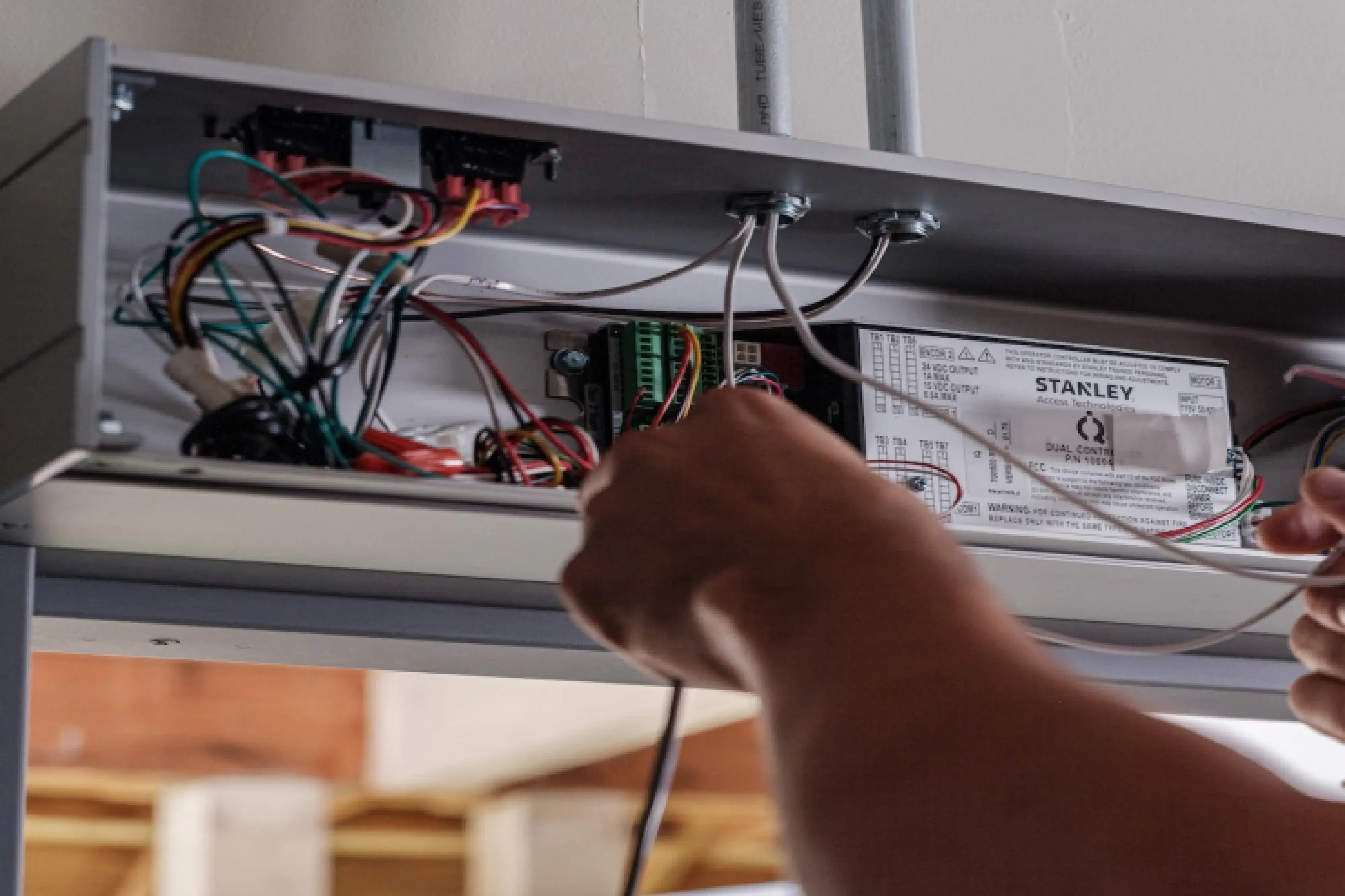 SAT technician installing a door header