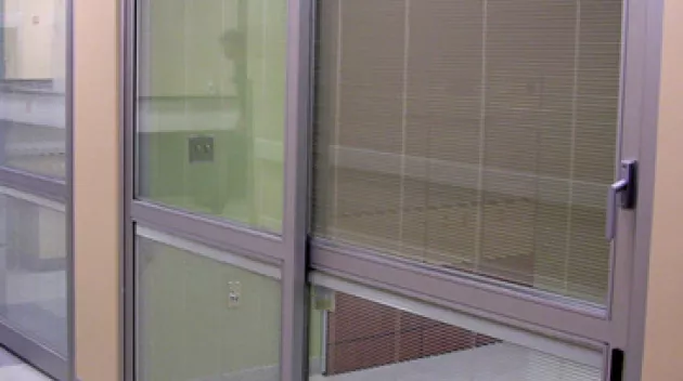 A set of doors in a hospital room.