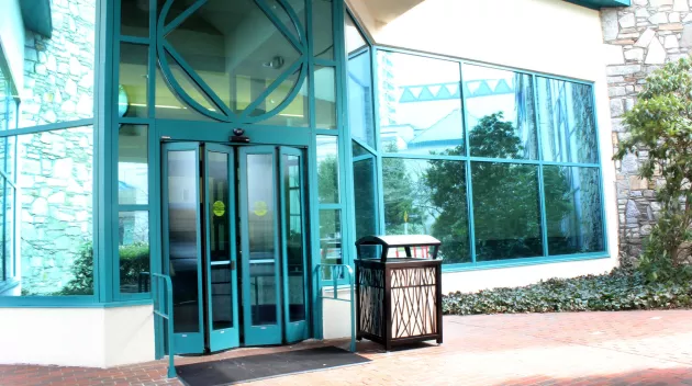 A set of folding doors to a building.