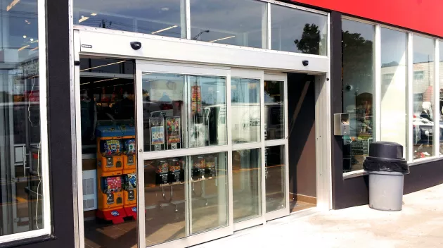 A set of bypass doors to a store.