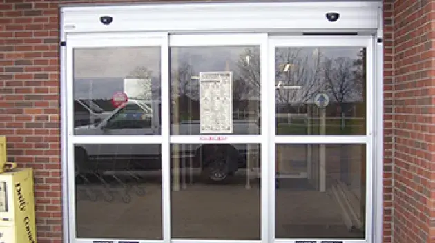 A set of bypass doors to a store.