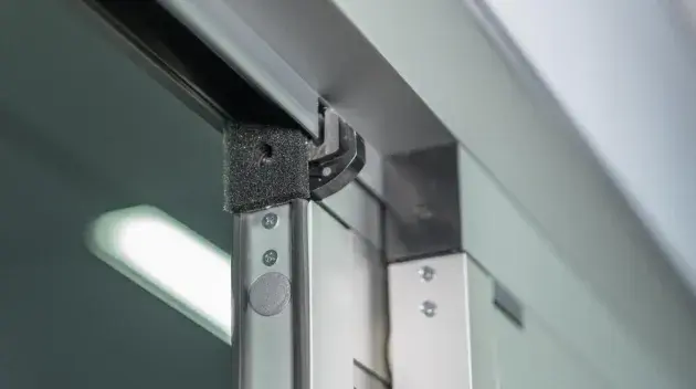 A closeup of the top of the sliding door.