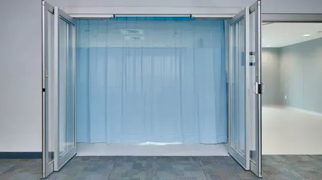A set of hospital doors fully opened.