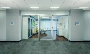 A set of sliding doors in a hospital room.