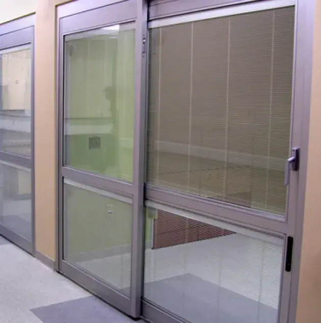 A set of doors in a hospital room.