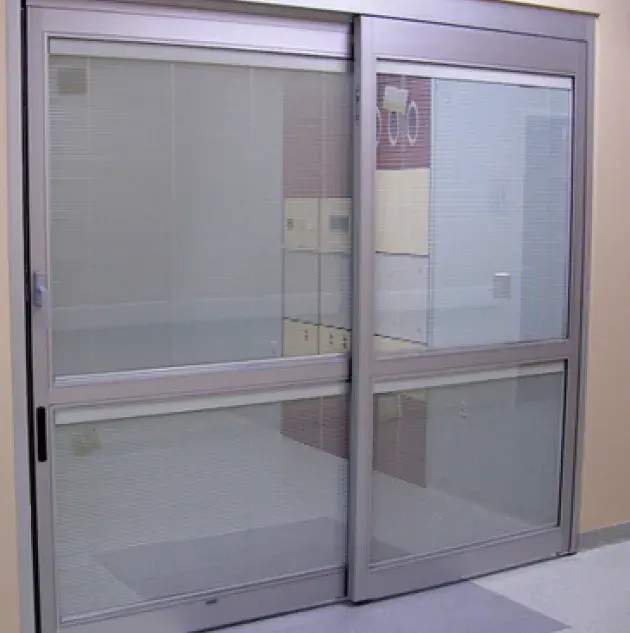 A set of doors in a hospital room.