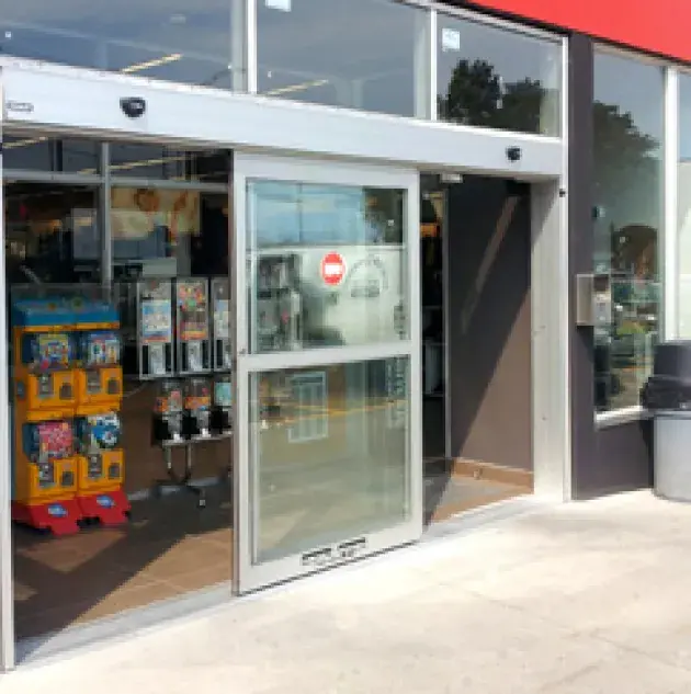 A set of bypass doors to a store.