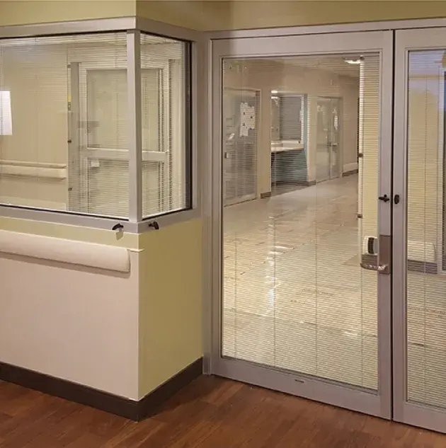 A set of doors in a hospital room.