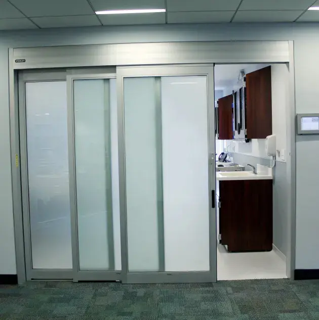 A set of doors in a hospital room.