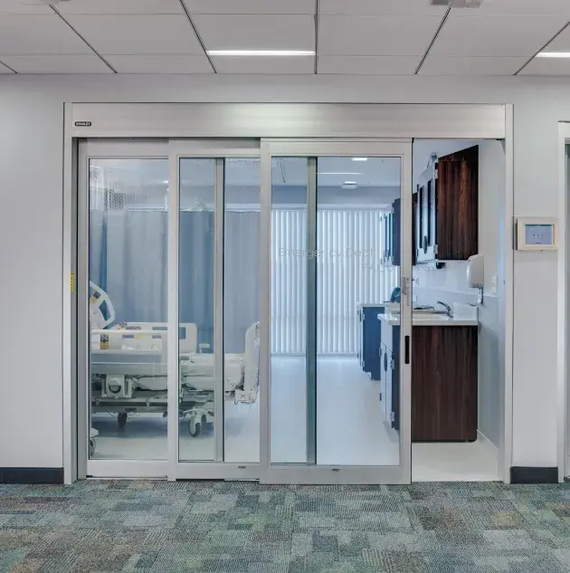 A manual sliding door in a hospital setting.