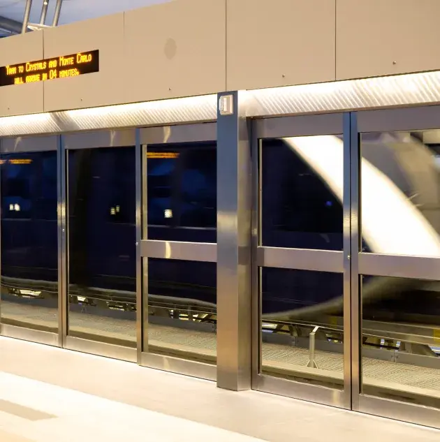 Screen doors on a transit platform.