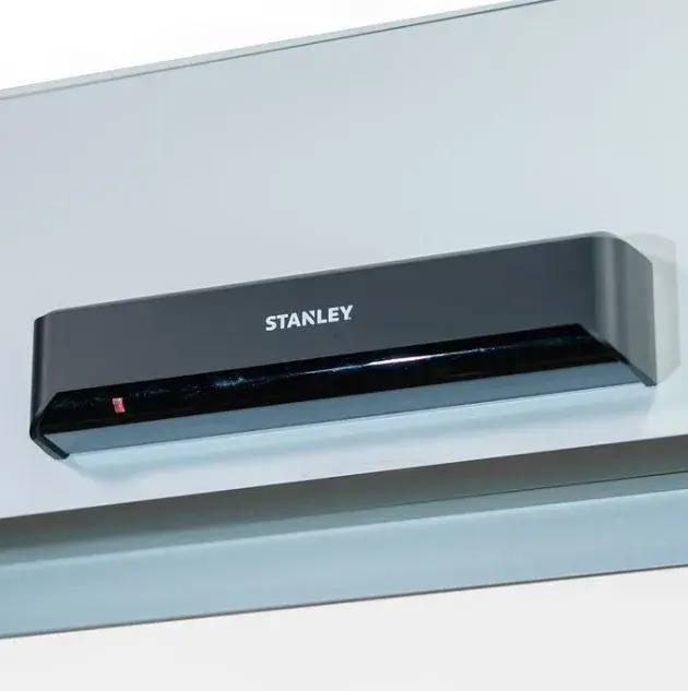 A door sensor above the door.