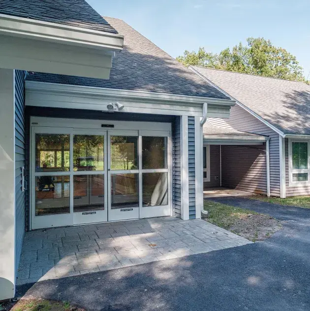 Dura-Glide automatic door as entrance of assisted living community building.