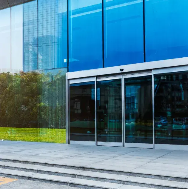 exterior of building with automatic slide doors.