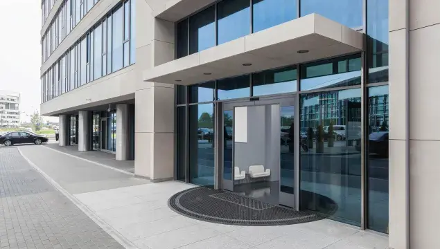 A set of open doors to a commercial store.
