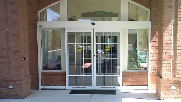 A set of dura glide doors in an arch.